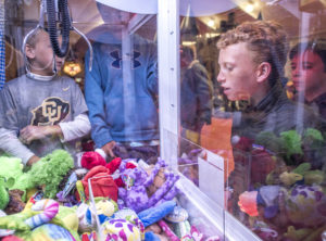 kids playing crane game