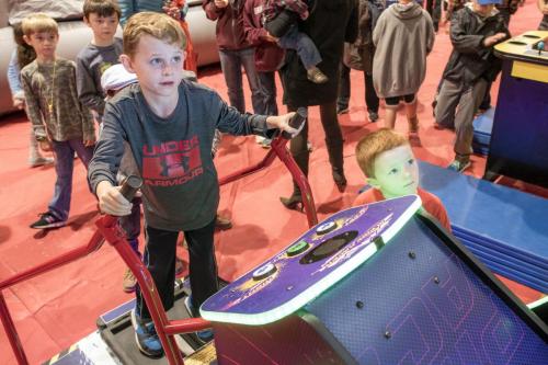 kids playing racing simulator games