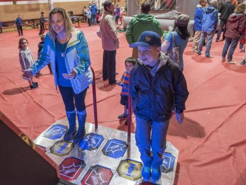 Kids playing Dance Dance Revolution SuperNova