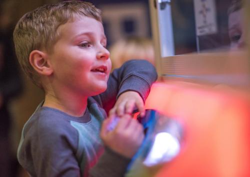 kids playing crane game